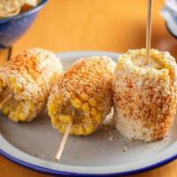 Elote · Roasted Corn on the cob with mayo, cotija cheese and chile piquin.