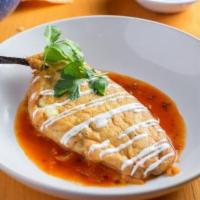 Chile Poblano · One Poblano peppers stuffed with melted chihuahua cheese, topped with tomato creamy sauce.