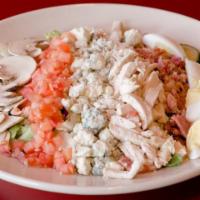 Cobb · Fresh mixed greens covered with rows of your favorites: grilled chicken, bleu cheese crumble...