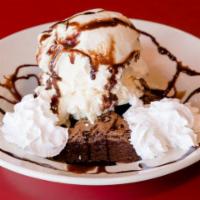 Brownie Sundae · Our delicious warm brownie is topped with creamy vanilla ice cream, smothered in chocolate s...