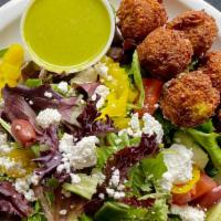 Salad (Gf & V Falafel) · organic salad greens, tomatoes, cucumbers, feta, kalamata olives, banana peppers, red wine v...