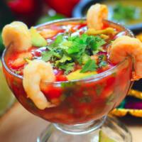 Shrimp Soup · Made with shrimp,tomato, onions, cilantro & tasty sauce, choice served hot or cold.