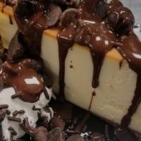 Chocolate Dream Cheesecake Sundae · Cheesecake, chocolate sauce, milk chocolate pieces, dark chocolate pieces, whipped cream and...