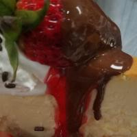 Chocolate Covered Strawberry Sundae · Cheesecake, fresh strawberries, strawberry compote, whipped cream and chocolate magic shell.