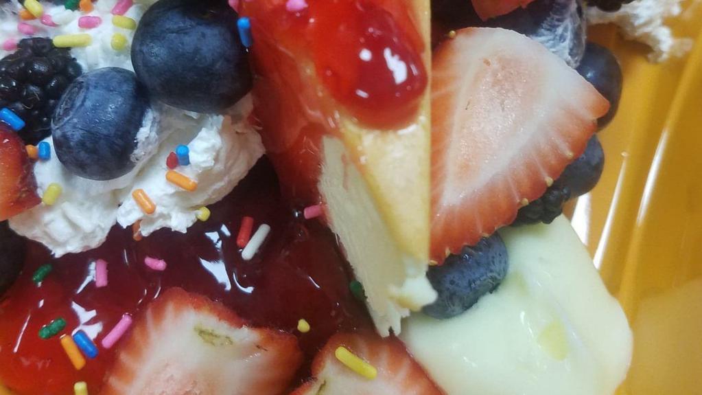 Berry-Licious Cheesecake Sundae · Cheesecake, strawberry compote, raspberry compote, lemon compote,  whipped cream, & fresh mixed berries