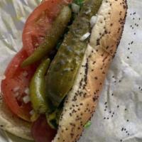 San Fran Dog · Chili, onions, mustard, ketchup, relish, tomato, pickle, cheddar cheese, and celery salt.