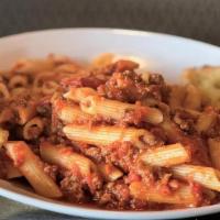 Penne Meat Sauce · penne topped with Georgio's meat sauce.  served with a piece of garlic bread.