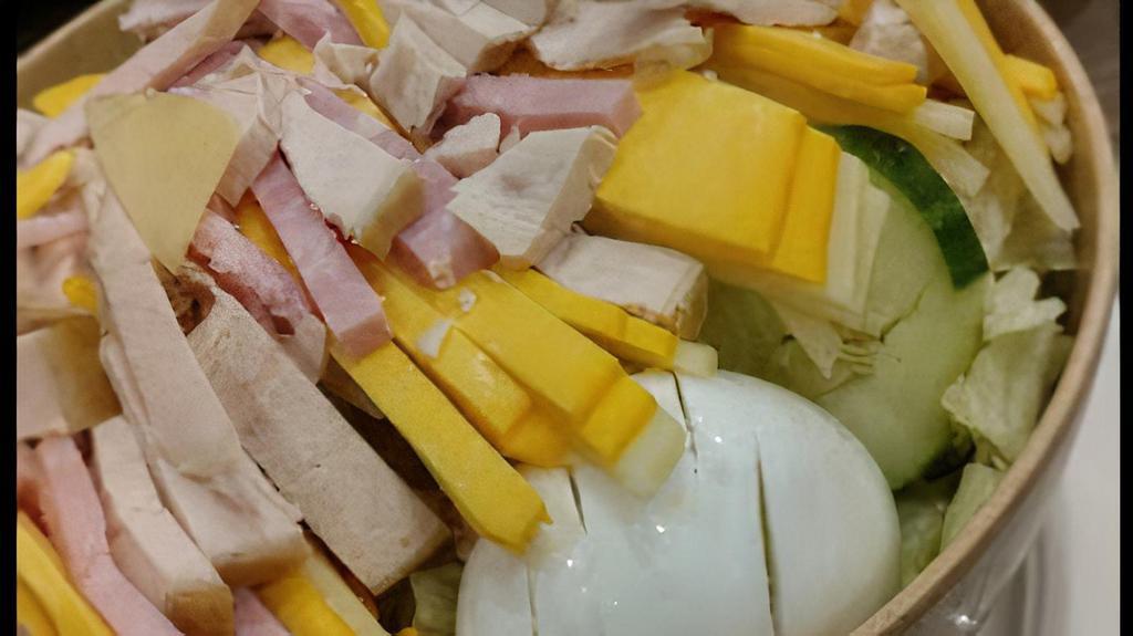 Small Chef Salad · Tomato, cucumber, ham, turkey, swiss and American cheese, and hard boiled egg.