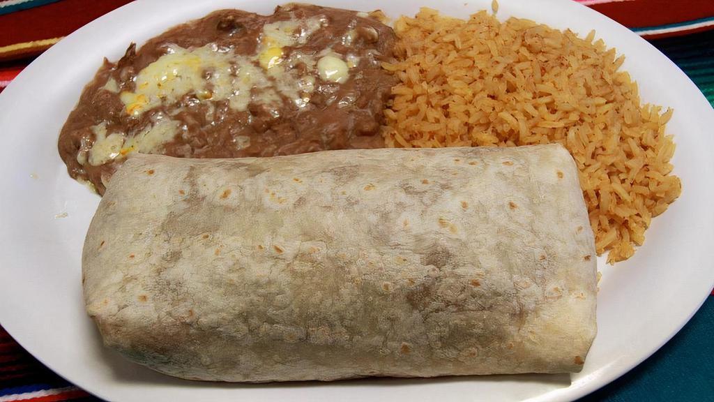 Burrito Dinner · With rice and beans. Choice of meat: steak, chorizo, chicken, al pastor, cochinita pibil, ground beef or veggies