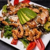 Grilled Chicken Salad · Chicken breast, spring mix, grilled bell peppers and onions with avocado and cheese
