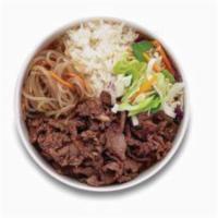 B Bop Online · Korean style BBQ beef. Served with rice, cabbage mix, and noodle.
