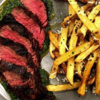 Steak Frites · 8 ounce top sirloin, served with seasoned fries tossed in truffle oil and shaved parmesan ch...