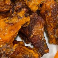 Spicy Buffalo Wings · This sauce is sure to please all classic Buffalo wing fans. Roasted Fresno peppers, red wine...