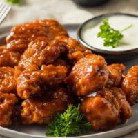 Bbq Boneless Chicken Wings · Fresh boneless chicken wings slathered in a house made BBQ sauce.