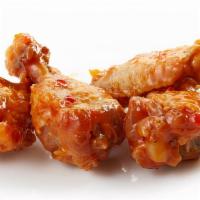Sweet & Mild Bone-In Chicken Wings · Fresh boneless chicken wings marinated in a house made sweet and mild sauce.