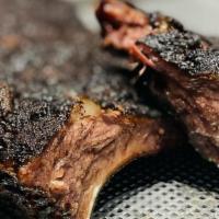 Rib Tips · Pork rib tips that are smoked for five hours in a combination of hickory and apple wood. Rub...