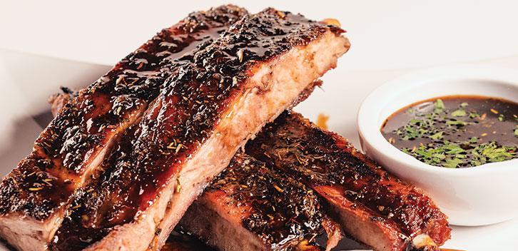 Tuscan Ribs · Marinated pork spare ribs, slow-roasted until tender and served with a tangy Italian-style dipping sauce. You’ll shout Mamma Mia!