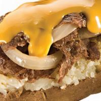 The Great Potato · Your choice of steak or chicken grilled with onions, and topped with Philly cheese.