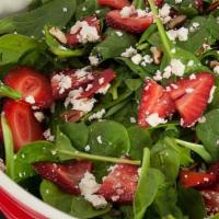 Spinach And Strawberry Salad · Baby spinach, strawberries, goat cheese, candied pecans, onion, and grilled chicken tossed w...
