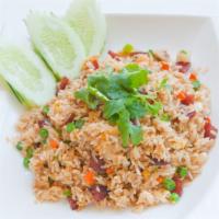 #4. Thai Fried Rice · Thai fried rice with egg tomatoes carrot and onion.