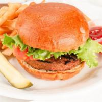 Veggie Burger · Our veggie patty served with lettuce, tomato and a pickle on an artisan brioche bun, with a ...