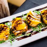 Goat Cheese Crostini · Creamy goat cheese and peaches served warm on sliced sour dough baguettes, lightly drizzled ...