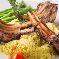 Double Lamb Chops · Grilled new zealand lamb chops marinated in soy sauce, teriyaki sauce, Orange juice and fres...