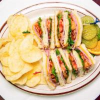 Club Sandwich · Ham, Bacon, tomato, lettuce, swiss and american cheese.