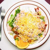 Chef Salad · Mixed greens, topped with smoked turkey, ham, Bacon, tomato, egg, and cheese.