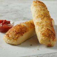 Breadsticks · Baked fresh daily and seasoned with our delicious garlic and Italian herbs. These breadstick...
