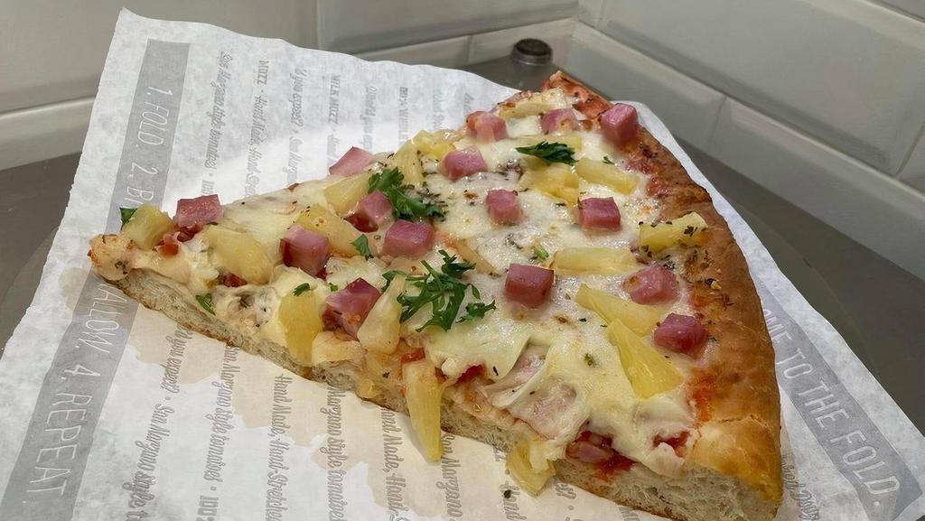 Pan Hawaiian Slice · Thick, hand-stretched dough, pan baked, topped with hand-crushed Roman sauce, freshly shredded 100% whole milk mozzarella, ham, and pineapple.