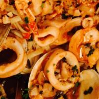 Liguini Pescatore · Clams,Calamari, Mussels, & Shrimp in Red or White Sauce