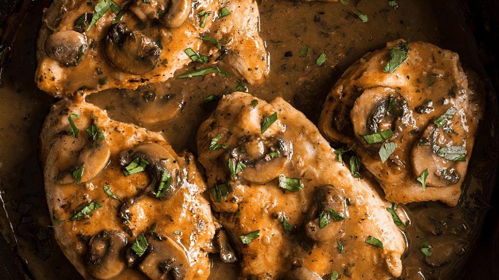 Veal Marsala · Sautéed in onions, mushrooms, tomatoes and marsala wine, served with mashed potatoes