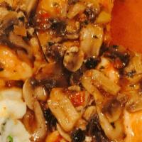 Chicken Marsala · Sauteed in onions, mushrooms, tomatoes and Marsala wine, served with Vesuvio mashed potatoes.