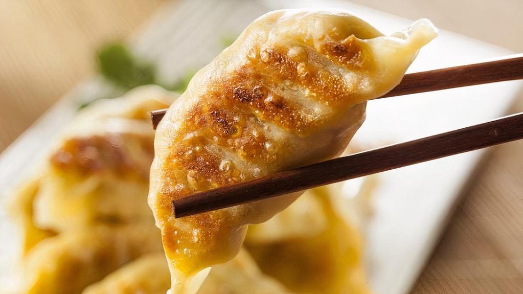 Fried Pot Sticker (5Pcs) · Deep fried minced chicken and vegetables stuffed in Thai gyoza pocket with sweet chili soy sauce