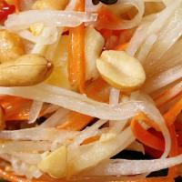 Som Tum (Papaya Salad) · Spicy. Papaya salad, shredded green papaya with shrimp carrots, tomatoes, string beans, pean...