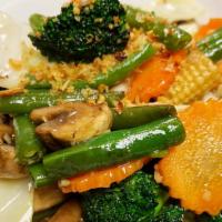 Mixed Vegetable Stir-Fry · Spicy. Sautéed with Napa, cabbage, mushrooms, broccoli, carrots, green beans with brown sauce.
