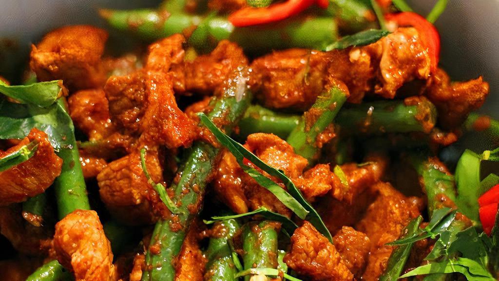 Pad Prik Khing · Spicy. Sautéed with chili paste, green beans, red bell peppers, and kaffir lime leaves.