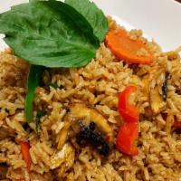 Basil Fried Rice · Fried rice with tomatoes, onions, egg, bell peppers, chili and fresh basil leaves