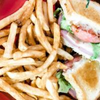 Club Sandwich · Turkey, ham, Mozzarella cheese, bacon,
lettuce, tomato, mayonnaise on locally
made sourdough...