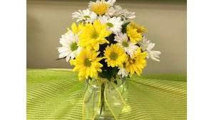 Daisy Days · Sunny and bright mix of yellow and white daisies. Sure to brighten any day.   Hand arranged ...