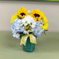 Summer Sentiments · Blue hydrangea, yellow daisies, white daisies and sunflowers arranged in a blue vase.  Hand ...