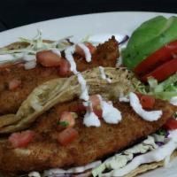 Fish Tacos · Haddock -  Avocado- cabbage- salsa fresca - queso fresco- chipotle mayo- salsa verde - cilan...