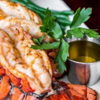 Twin Maine Lobster Tails · Two  4oz grilled lobster tails - drawn butter - charred lemon