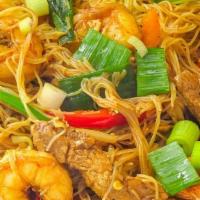 Singapore Noodle · Hot & Spicy. Stir-fried rice noodle, egg, bell pepper, onion, carrot, Napa, bean sprout, and...