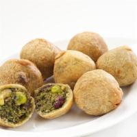 Lilva Kachori  · Made with green pigeon peas toover lilva, green masala, coconut and cashew.