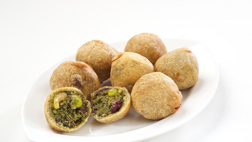 Lilva Kachori  · Made with green pigeon peas toover lilva, green masala, coconut and cashew.