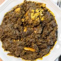 Cassava Leaf · A savory stew made from yucca leaves and cooked in a chicken broth. Seasoned with herbs and ...