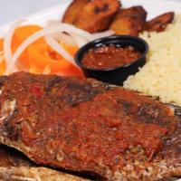 Attieke Fried Fish & Plantain · Couscous cooked to fluffy perfection and served with fried plantain, a whole seasoned fried ...