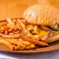 Bacon Cheeseburger · Niman Ranch ground beef, Wisconsin cheddar cheese, grilled onion, house cured bacon, secret ...